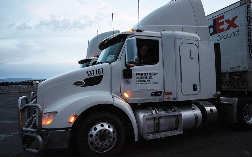 Freeport tractor 137767 with door lettering: Freeport Freight Systems Inc, Sparks NV, Contracted Service Provider